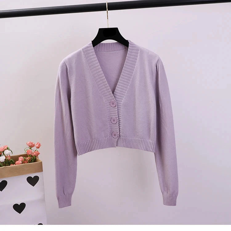 gilet court de couleur parme à col en V et à bouton pour femme