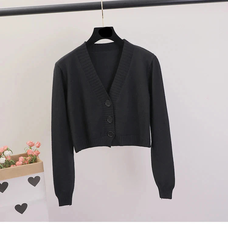 gilet pour femme de couleur noir à col en V et à bouton
